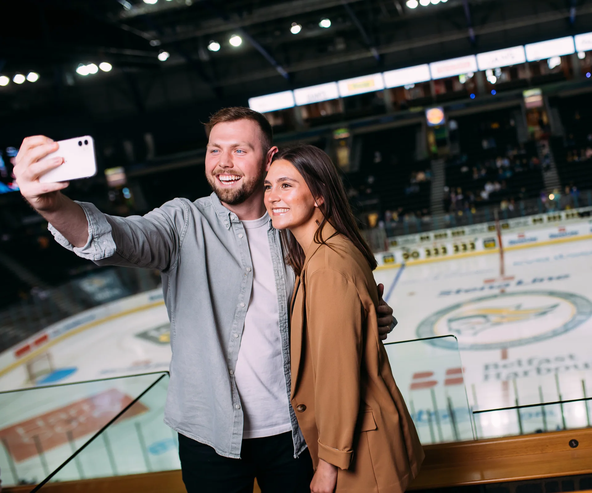 Couple pose for a photo in one of The O2 Belfast's suite for a night.