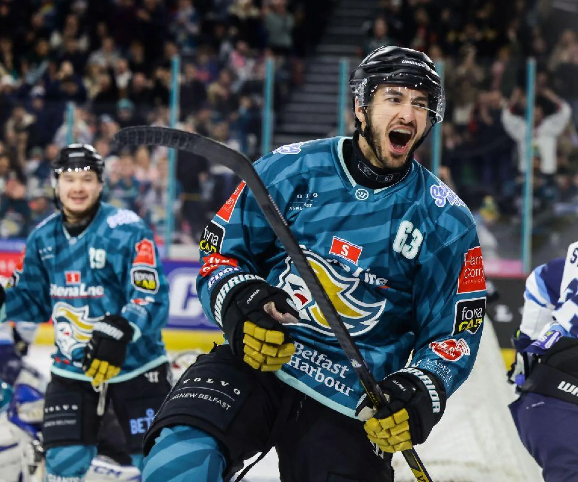 Belfast Giants player Jake Gaudet celebrates a goal during a game