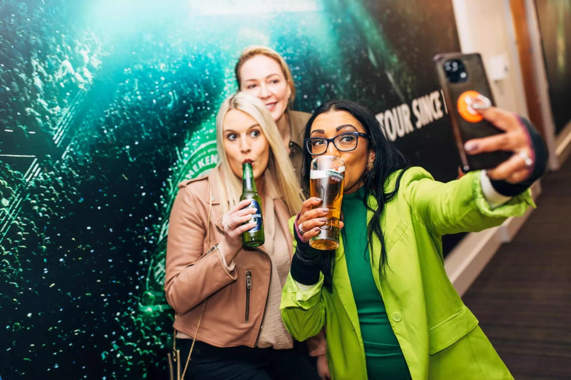 People taking selfie in the Heineken Lounge
