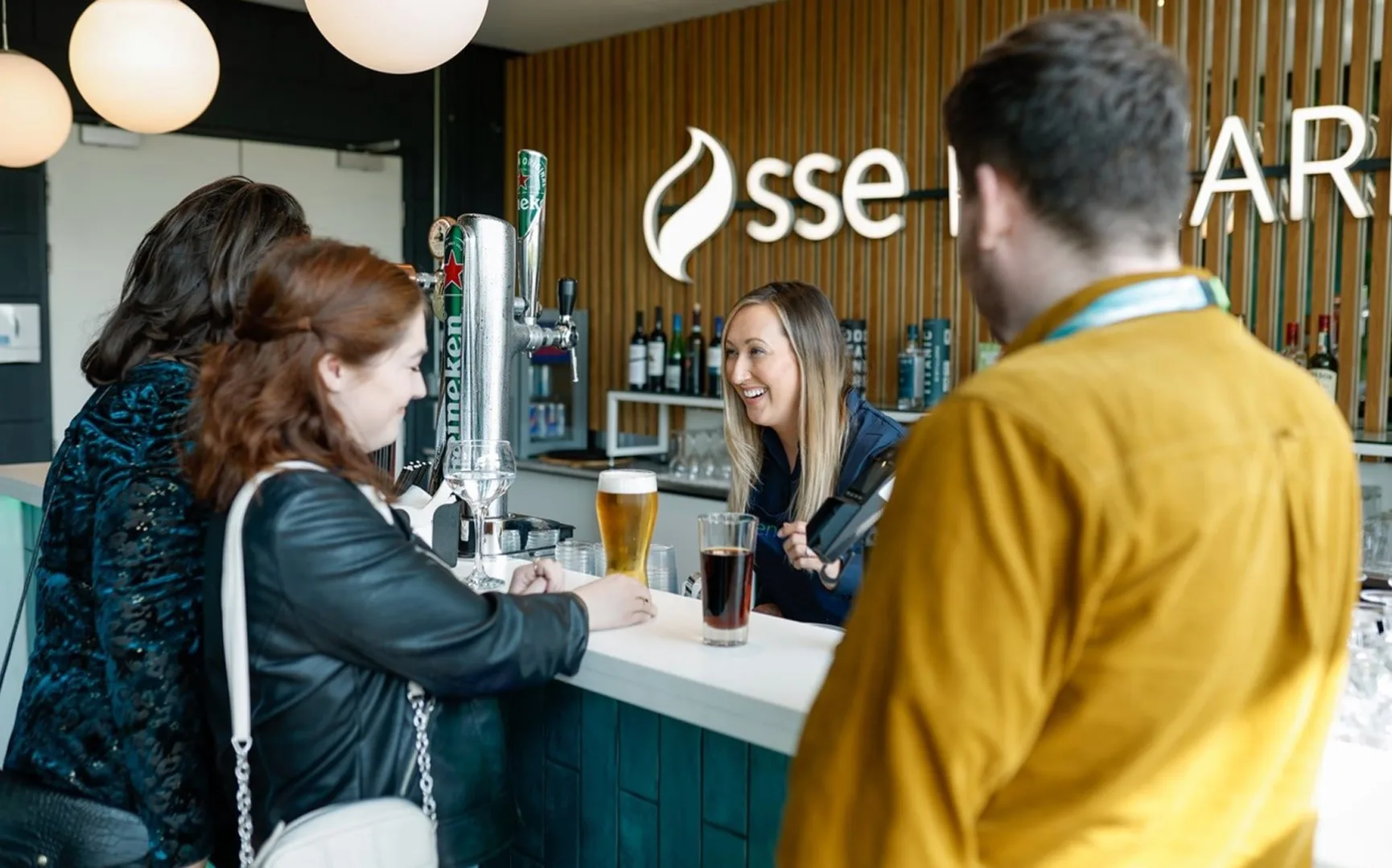 Customers enjoying O2 reward lounge